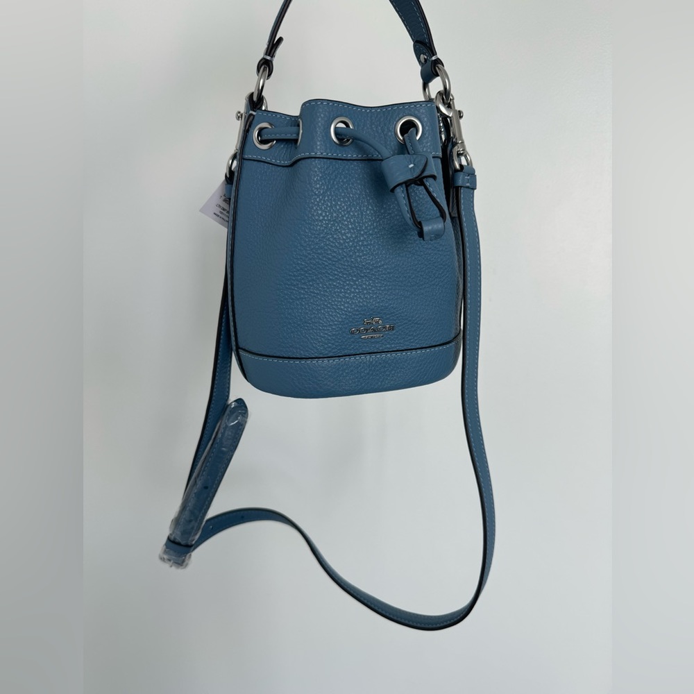 Coach light blue bucket bag
NWT prestine condition
Original price $328 - Picture 4 of 6